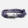 Pulsera gris con concha dorada